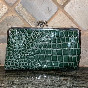 This is my super cute green clutch that is from fashion express.